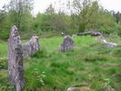 The stoneslab grave and three standing stones